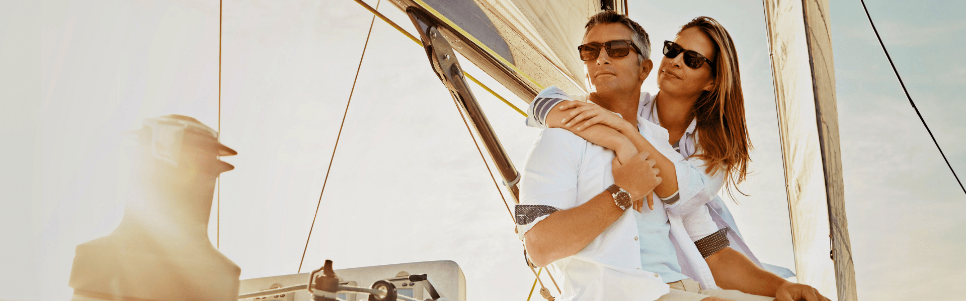 Couple enjoying a sailing adventure.